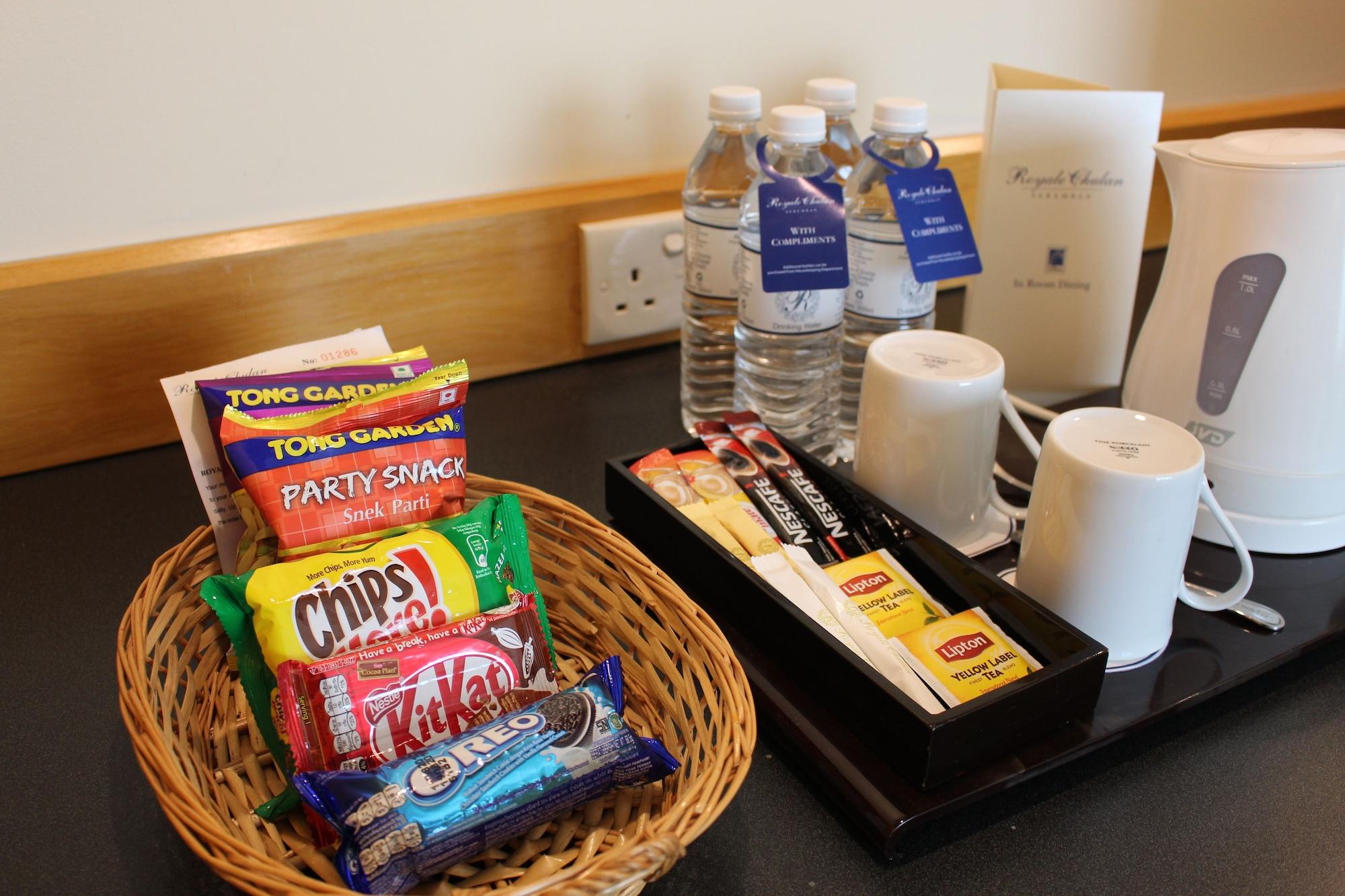 Royale Chulan Seremban Exterior photo A selection of snacks and bottled water in a hotel room